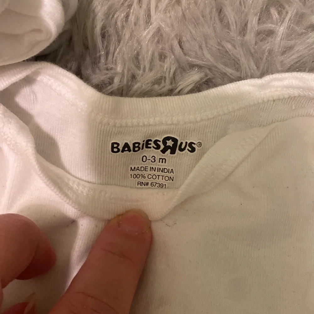 Bundle of 11 white short sleeved onesies